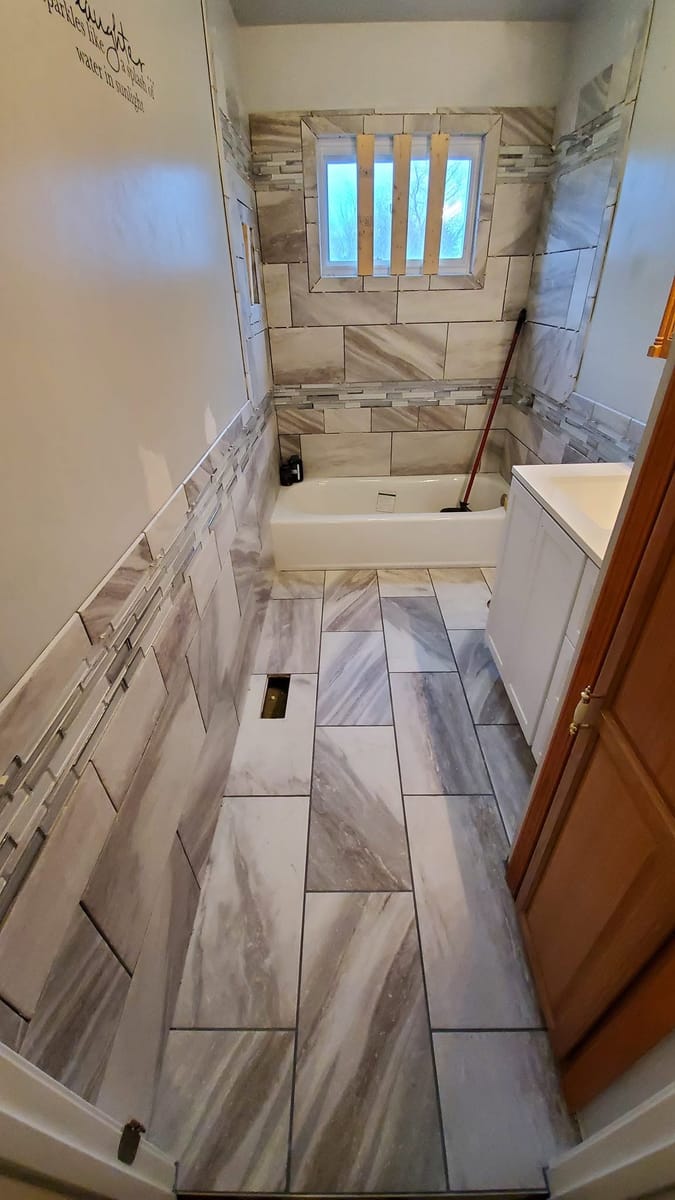 Tile Bath with Marble Floor