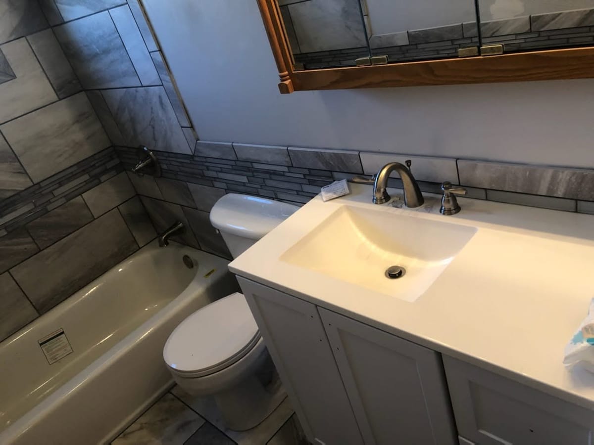 Vanity & Tiled Bath